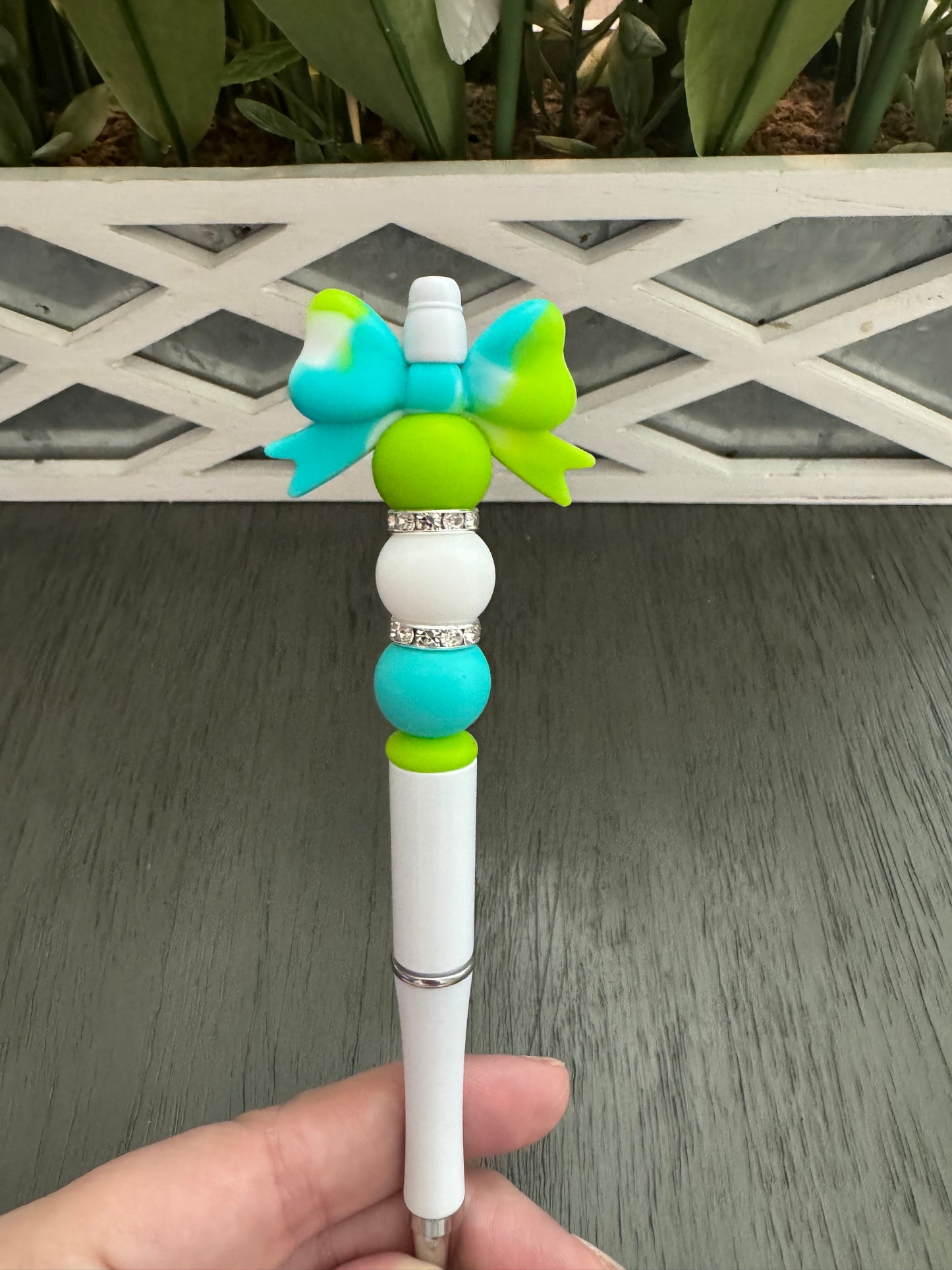 Neon green/blue bow