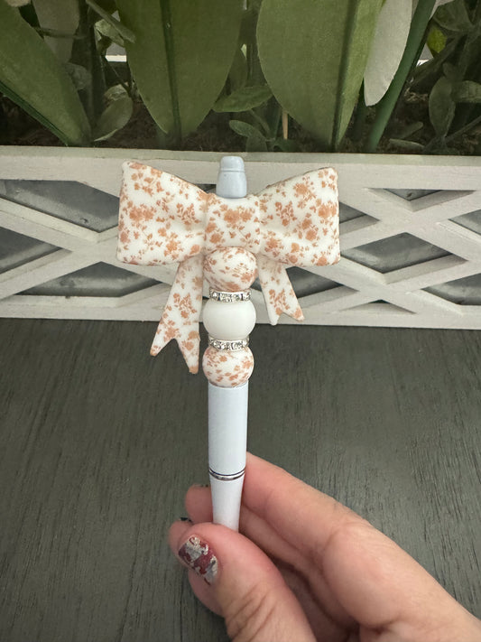 White and Brown Bow