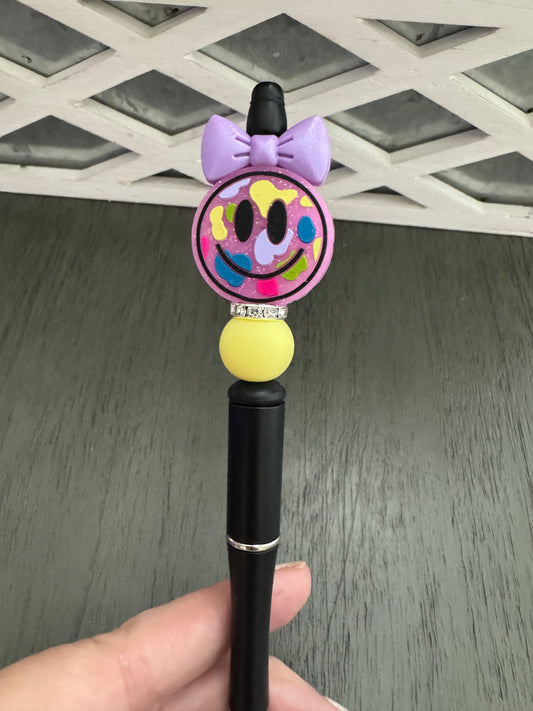 Happy face with bow